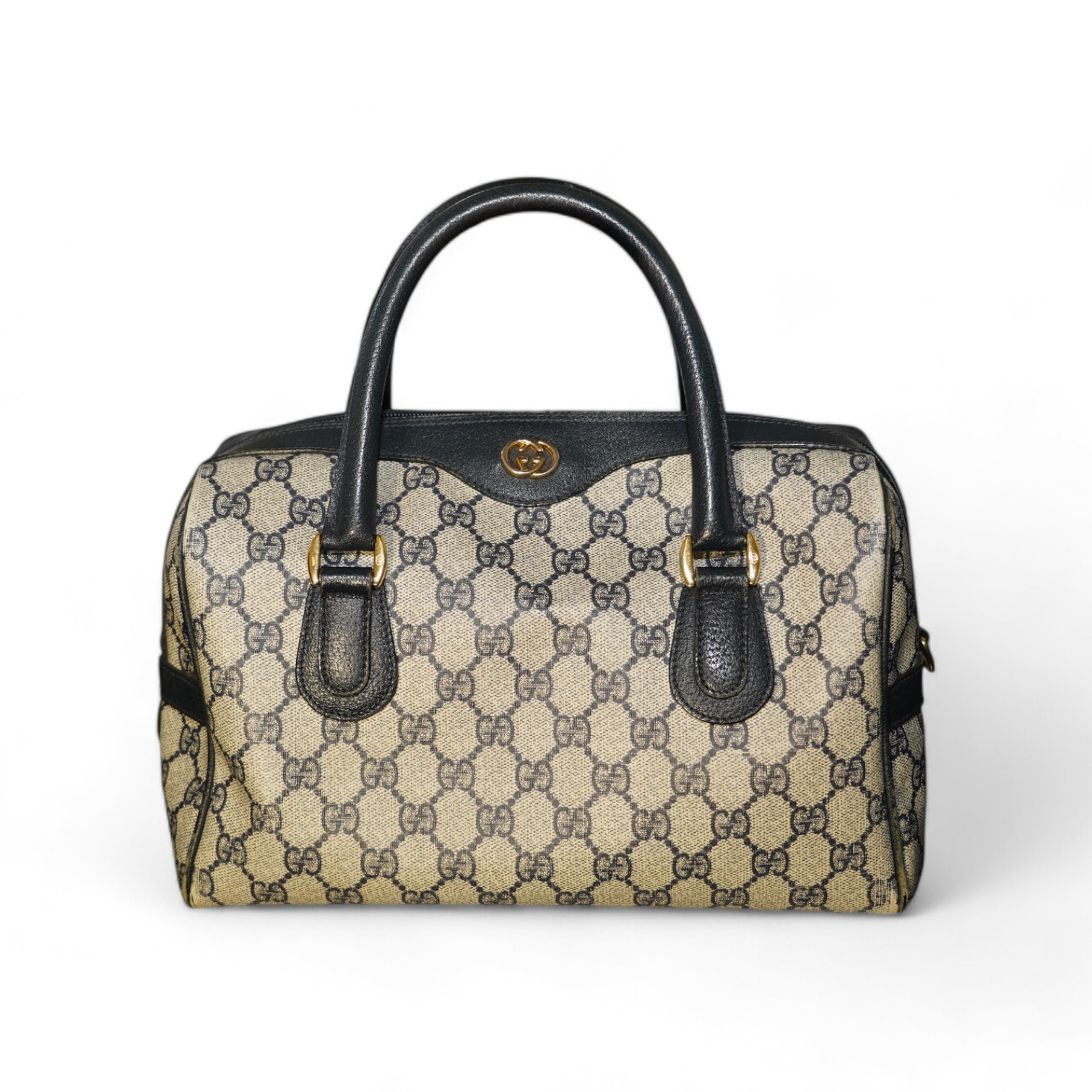 A Gucci monogram blue canvas handbag, wallet and purse